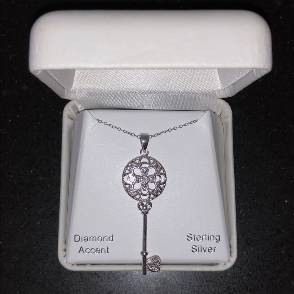 Sterling silver key pendant with chain. NWT.